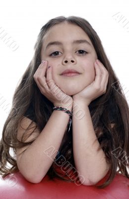 Young girl with an exercises ball