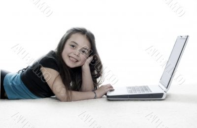 Young girl in front of a laptop Young girl in front of a laptop