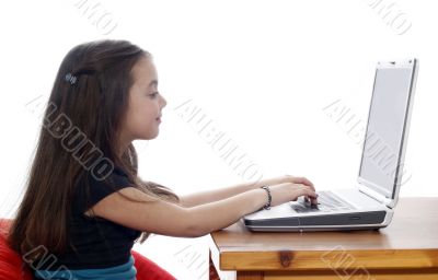 Young girl in front of a laptop Young girl in front of a laptop