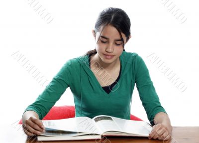 young woman reading in the library young woman reading in the library