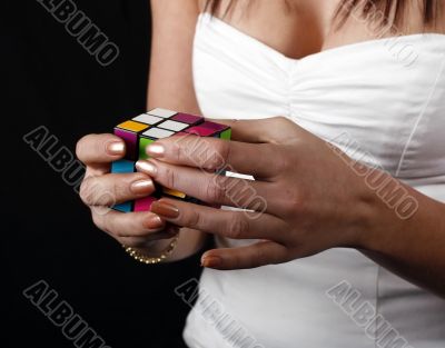girl solving rubik cube