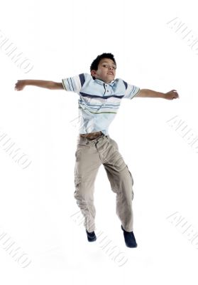 Young boy jumping up isolated on white Young boy jumping up isolated on white