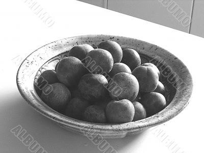 plums in a bowl plums in a bowl