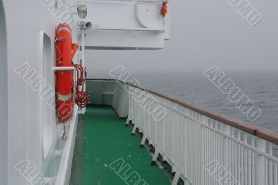 Cruise ship, life preserver, in calm seas