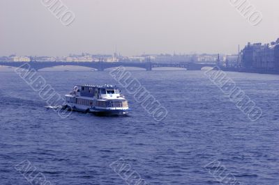 Boat across Neva river in St. Petersburg