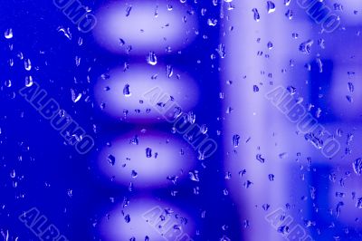 Abstract vivid blue background with waterdrops