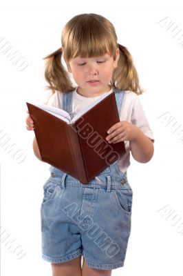 Little girl reading book