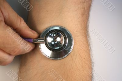 stethoscope on arm