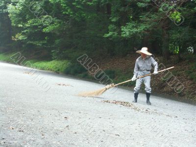 street cleaner at Morning in Tokyo garden