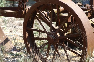 Old wheel  - a part of rust plow