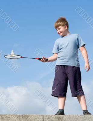 boy playing badminton