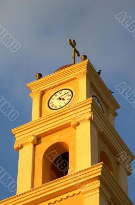 Clock tower with a cross