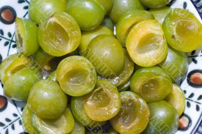 cut prunes in a plate cut prunes in a plate