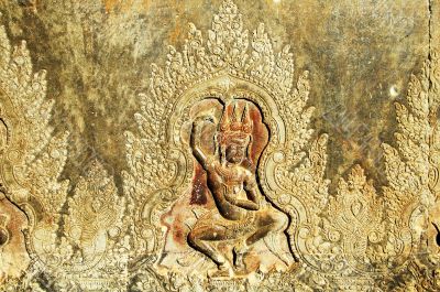 Sculpted wall at corridor of Angkor Wat, Cambodia