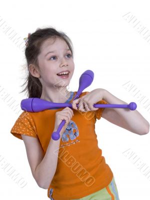 girl with gymnastic clubs