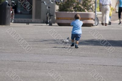 young boy running