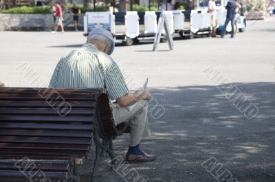 old man reading