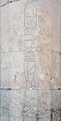 carved hieroglyph writing
