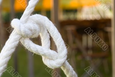 White Knot On Blurred Background