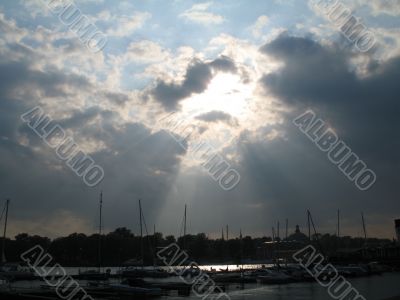 a sunlight rays shining through the clouds