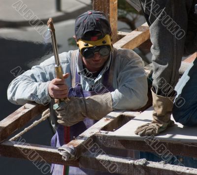 Welding construction workers