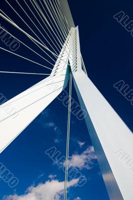 Abstract view on big white suspension bridge