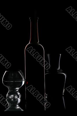 brown bottle and glasses