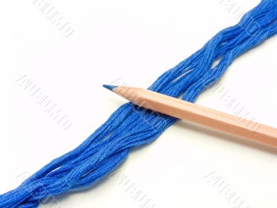 colourful pencil and threads