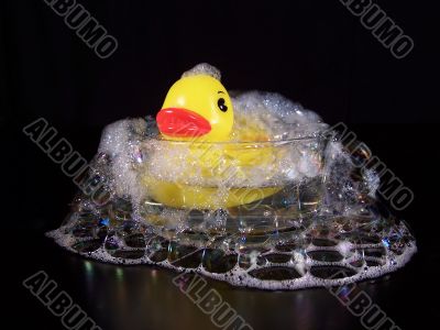 Yellow Rubber Duck In A Small Bubble Bath Yellow Rubber Duck In A Small Bubble Bath