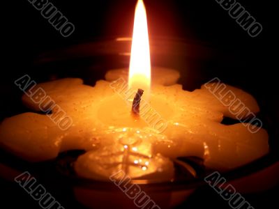 Burning Snowflake Candle Close Up