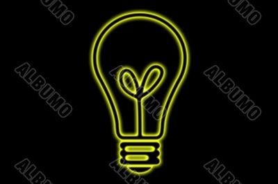 Yellow Glowing Light Bulb On A Black Background