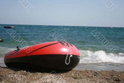 Red boat and seacoast