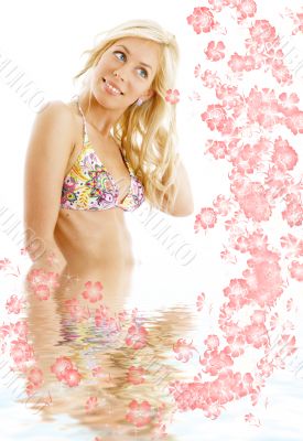 bikini blond #3 in water with flowers
