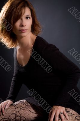 Beautiful woman on black background