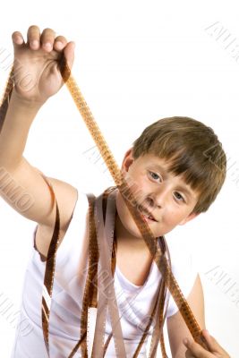Young boy with celluloid movie Young boy with celluloid movie