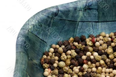 Peppercorns in bowl. Peppercorns in bowl.