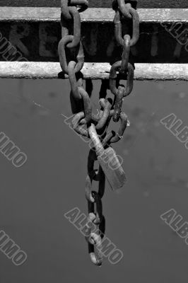 Rusted chain with padlock