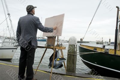 painter in harbor