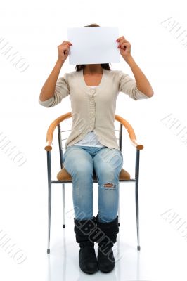 Sitting woman keeps sheet