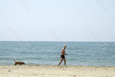 Running with his dog