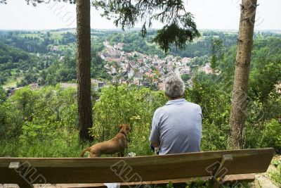 Man and dog at viewpoint