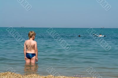 boy on the beach boy on the beach