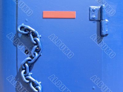Blue door with chain