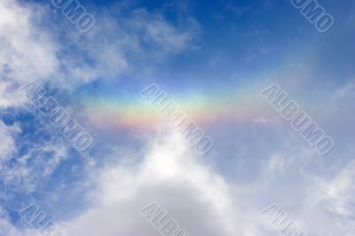 Rainbow above a head