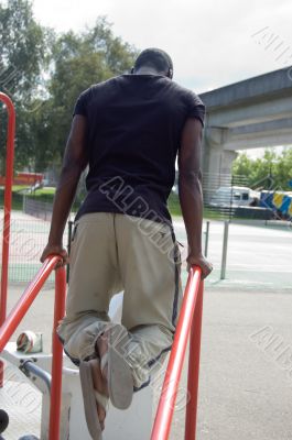 men lifting on bench