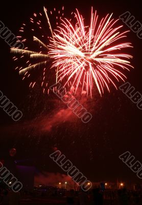 Night celebration fireworks upon dark sky