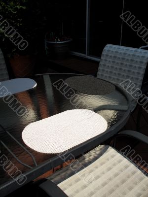 Suburban home backyard with patio furniture