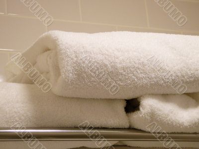 A Pile Of Folded Plush Towels