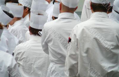 Group Of Chefs Standing In Uniform Whites Group Of Chefs Standing In Uniform Whites