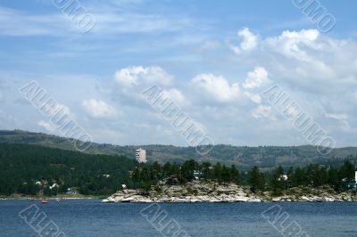 Clouds and pines